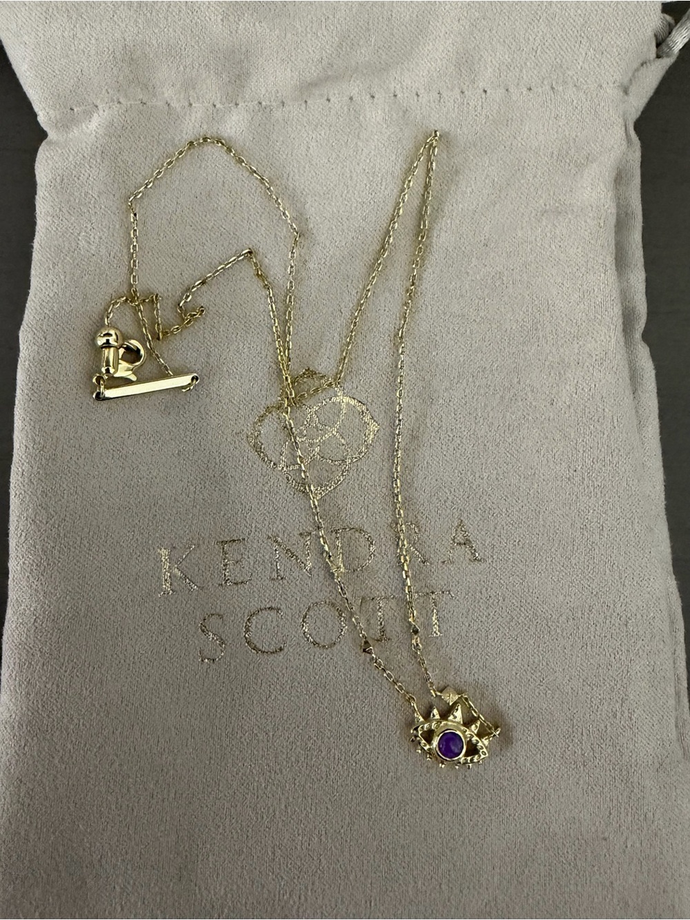 Kendra Scott Gold Eye Necklace with Purple Center Stone and Halo